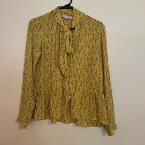Yellow peplum blouse